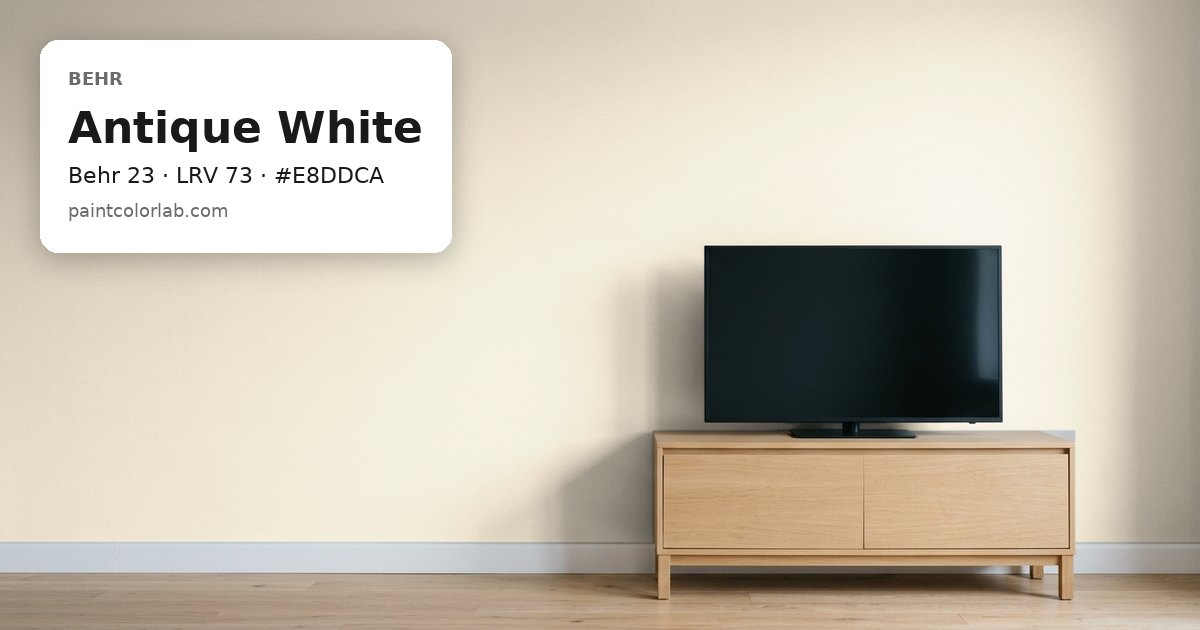 Living room with the wall painted Behr Antique White (Behr 23), hex #E8DDCA, LRV 73