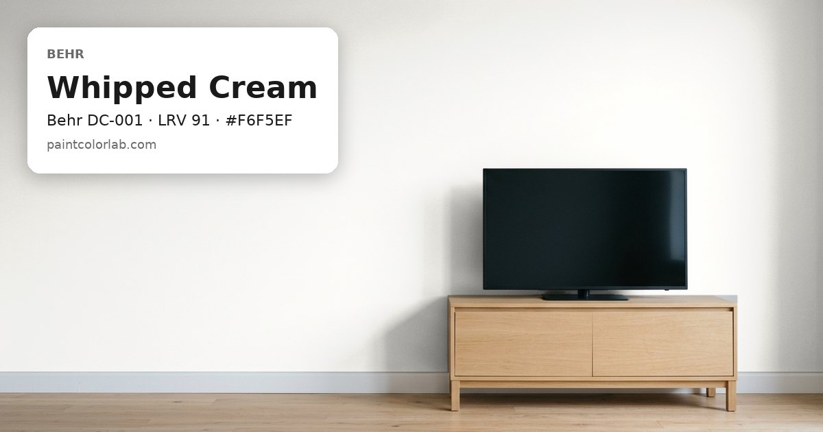 Living room with the wall painted Behr Whipped Cream (Behr DC-001), hex #F6F5EF, LRV 91